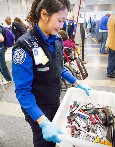 TSA_Officer_Carrying_Prohibited_Items